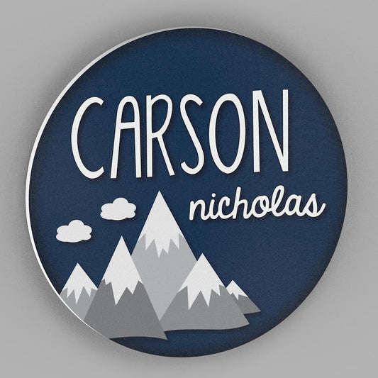 Circle name sign with Gray Mountains